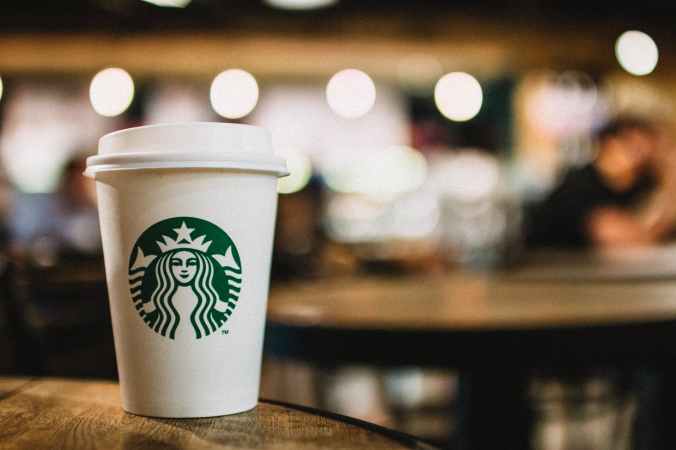 close up photography of starbucks disposable cup